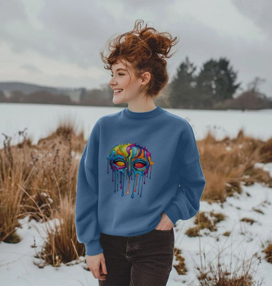 Blue sweatshirt with colorful dripping skull design (person)
