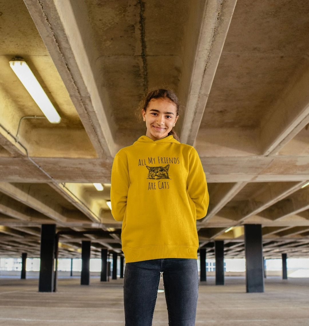 Yellow hoodie with "All My Friends Are Cats" text and cat graphic (person)