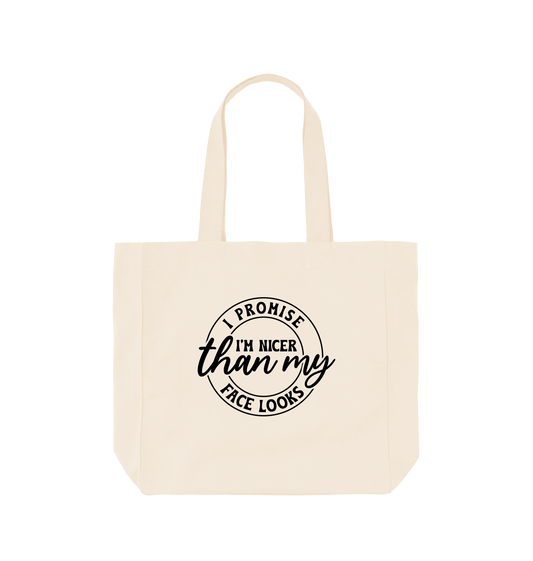 White tote bag with circular text design