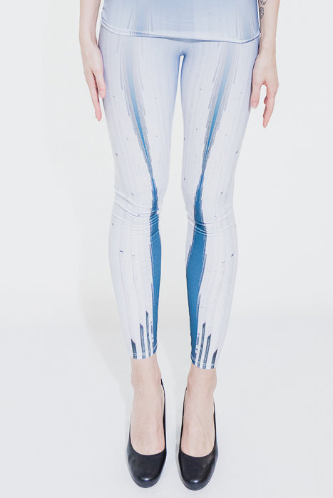 Blue and white leggings with abstract pattern (person)