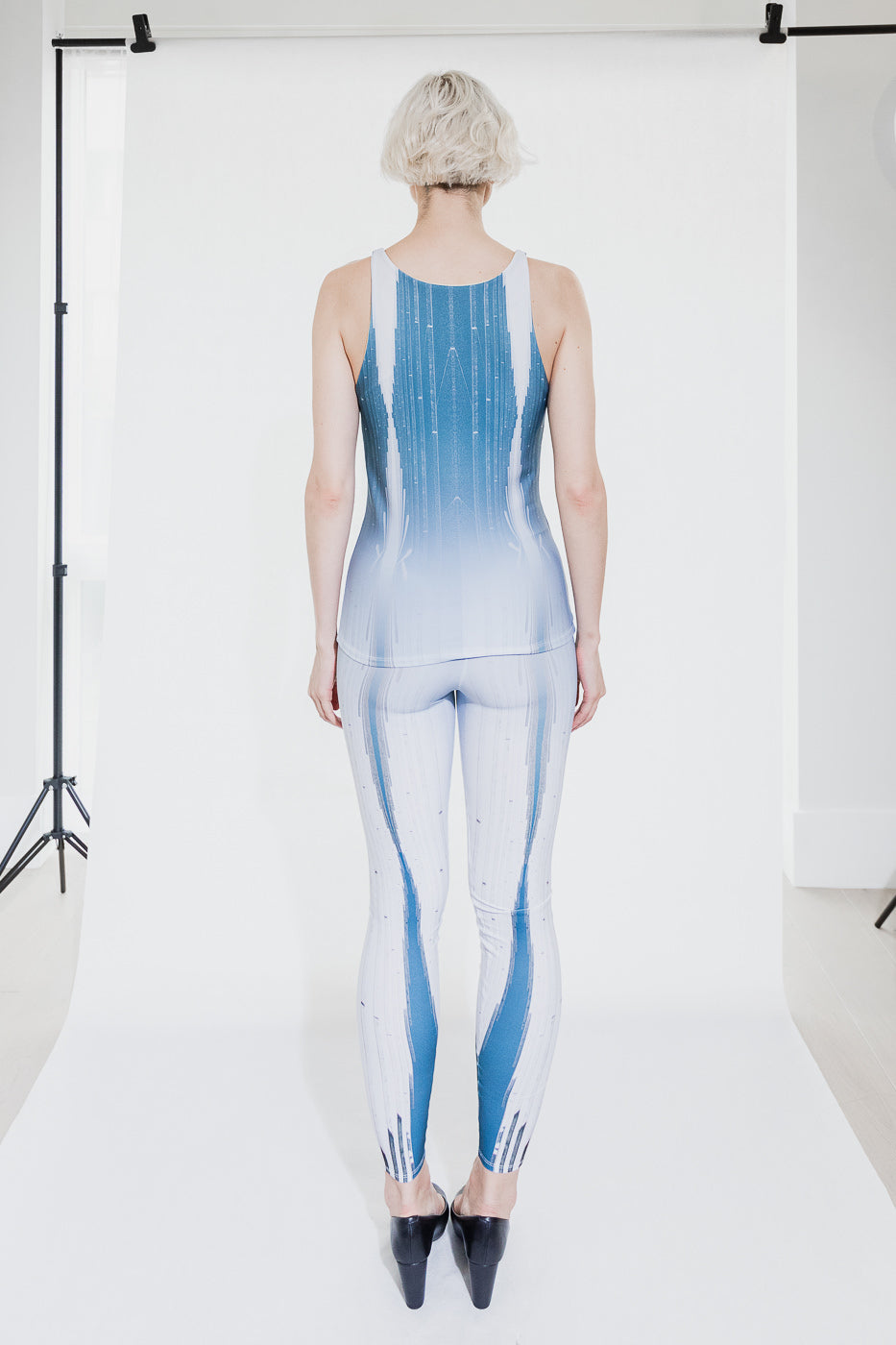 Blue and white patterned jumpsuit (person)