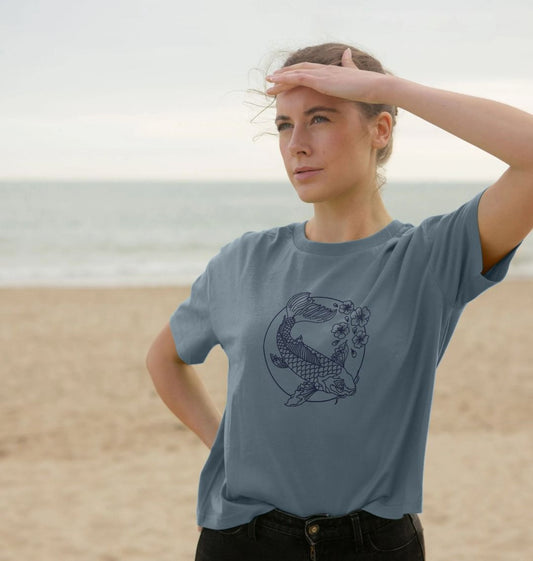 Blue t-shirt with koi fish design (person)