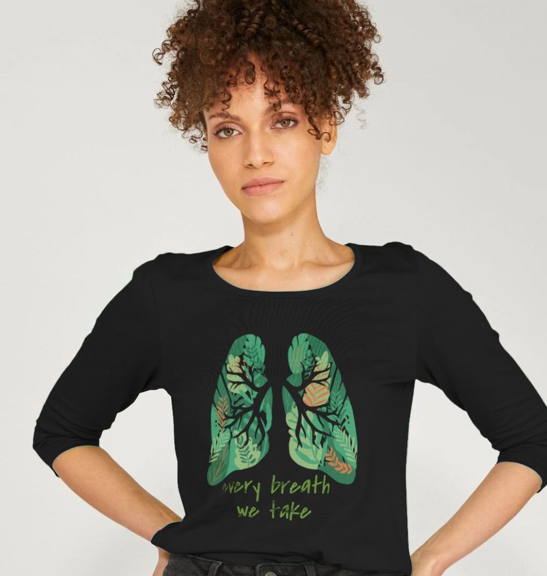 Black long-sleeve t-shirt with green leafy lungs design (person)
