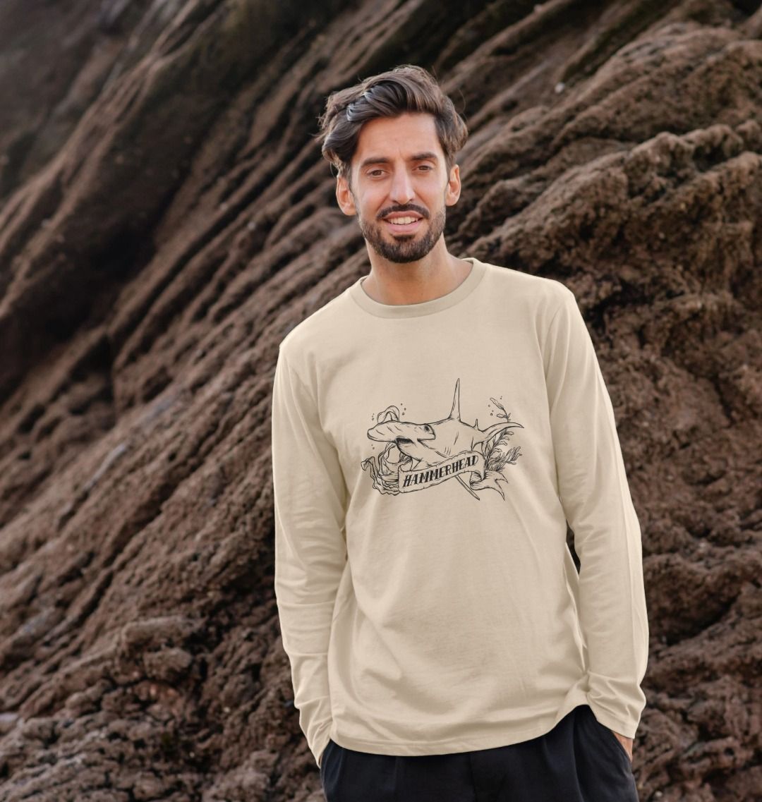 Beige long-sleeve shirt with hammerhead shark graphic (person)