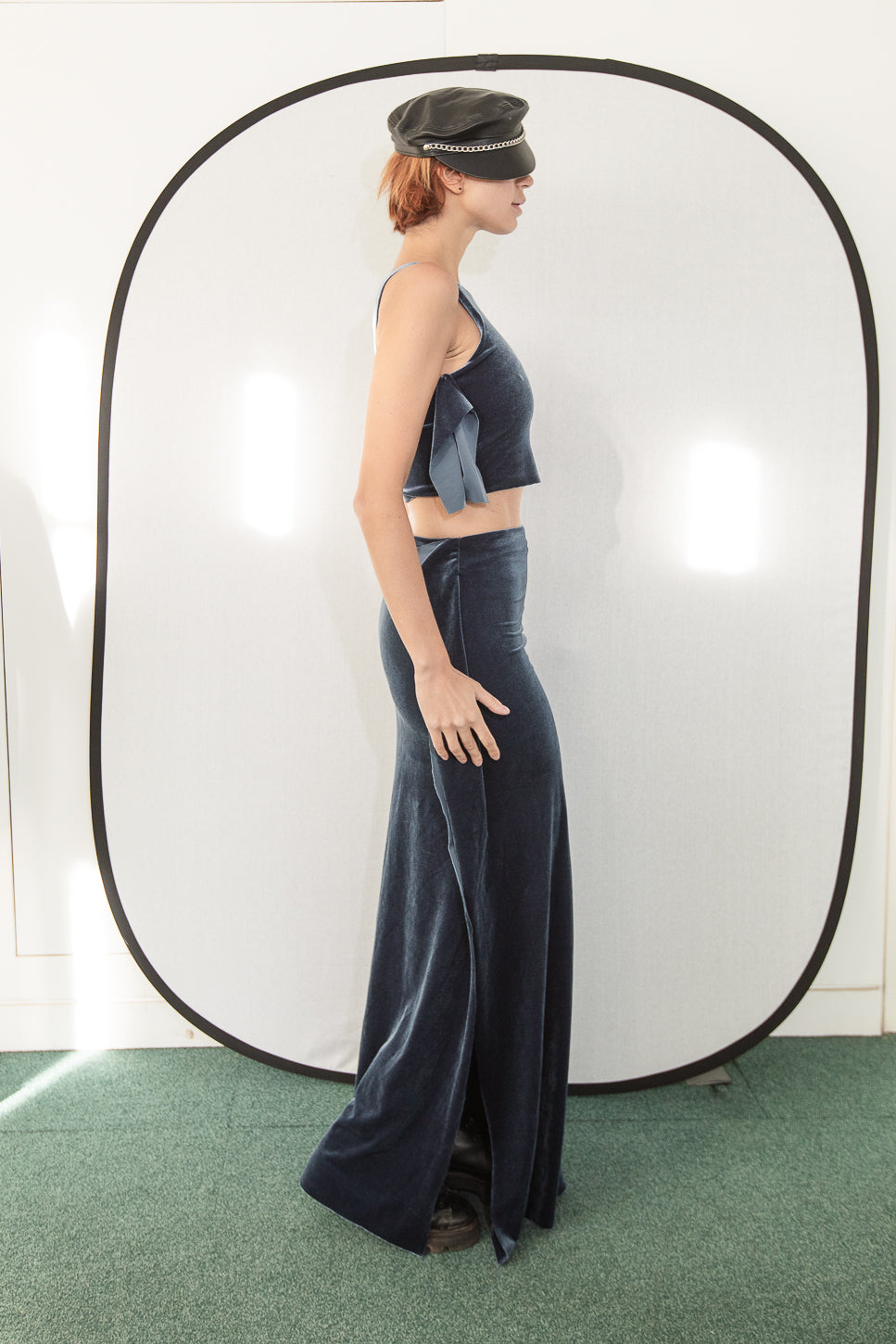 Velvet two-piece outfit with bow detail (person)