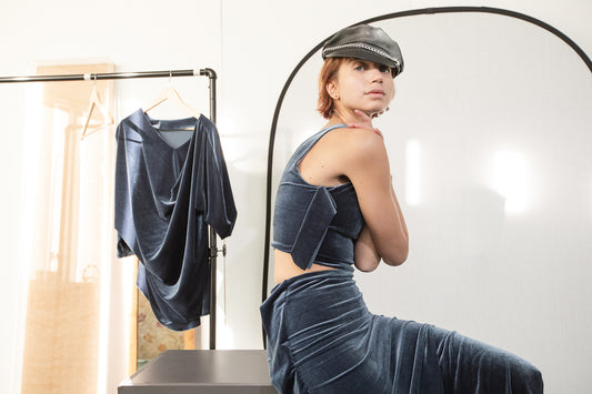 Blue velvet dress with bow detail (person)