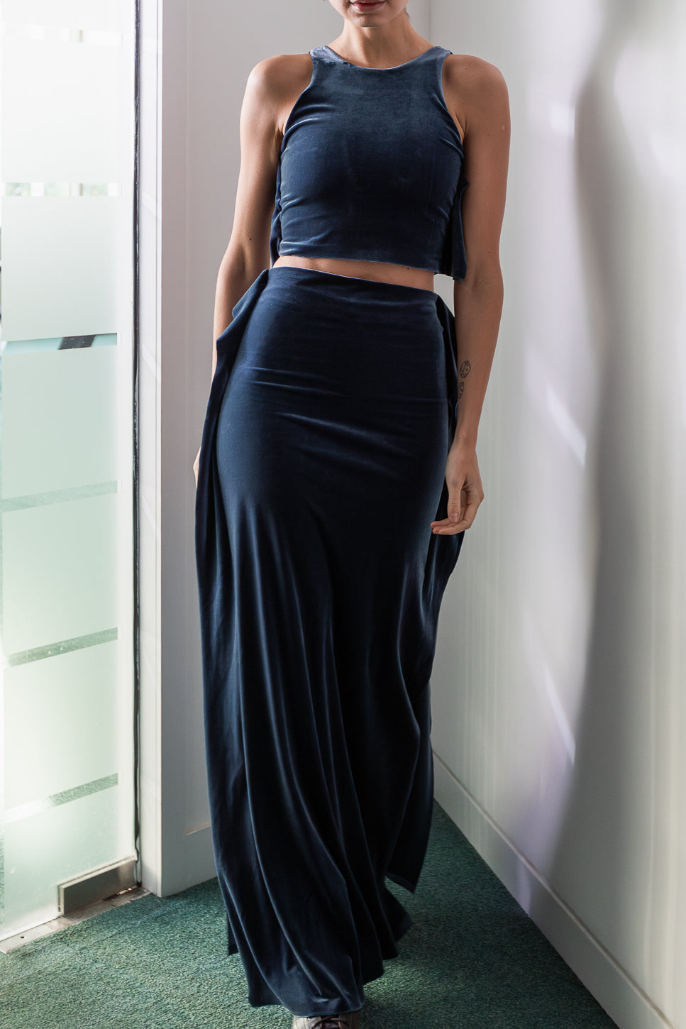 Navy blue velvet crop top and maxi skirt (person)