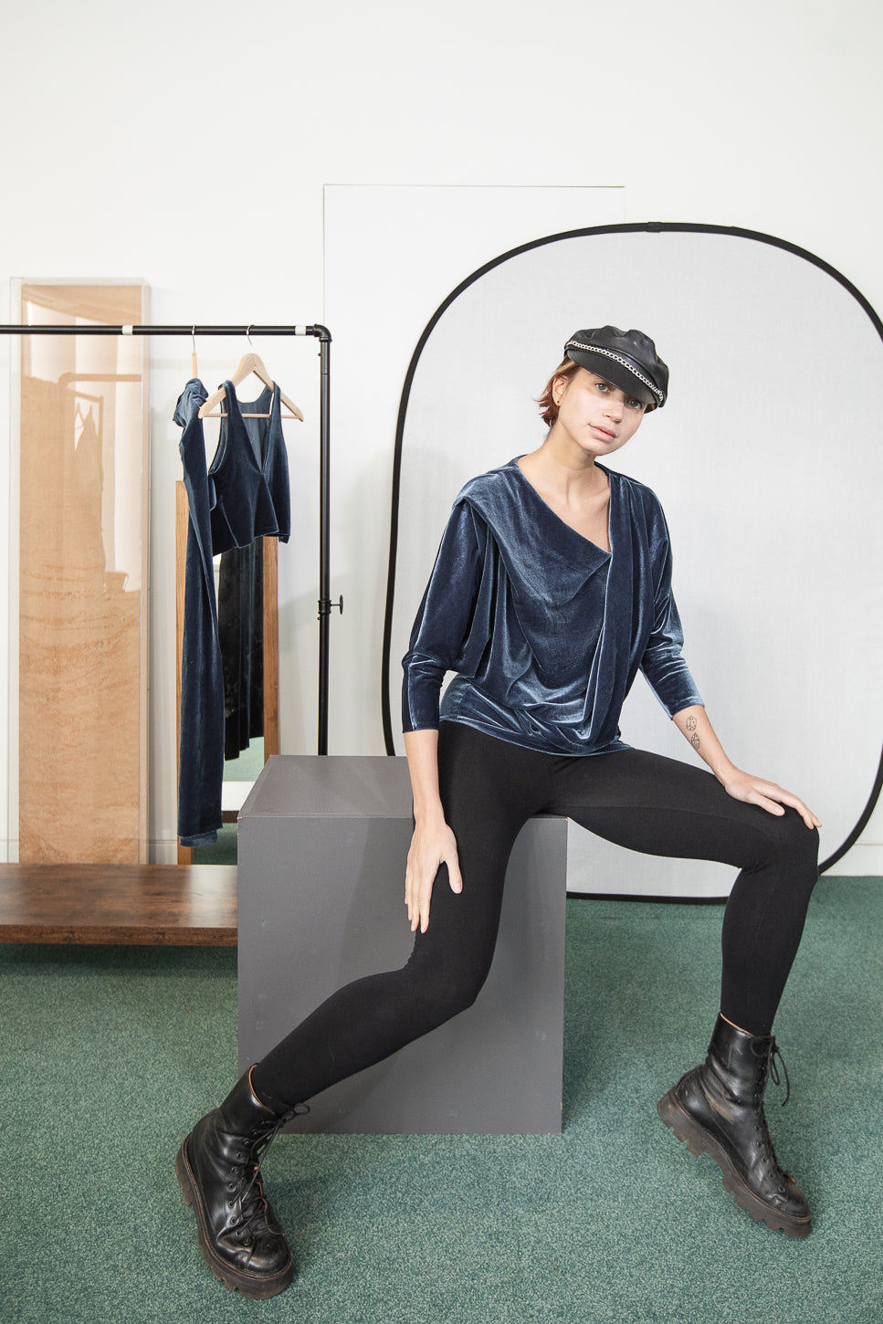 Velvet blouse with black cap and black leggings (person)