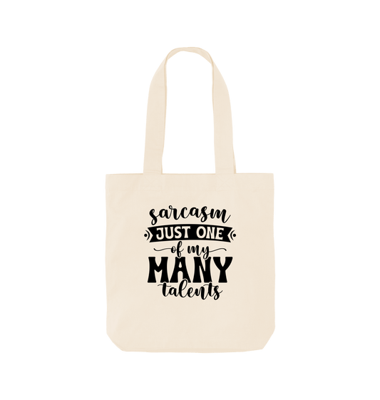 White tote bag with "sarcasm just one of my many talents" text