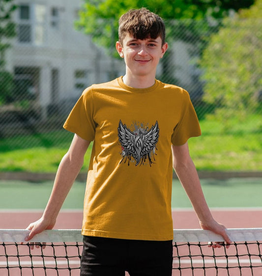 Mustard yellow t-shirt with winged skull design (person)