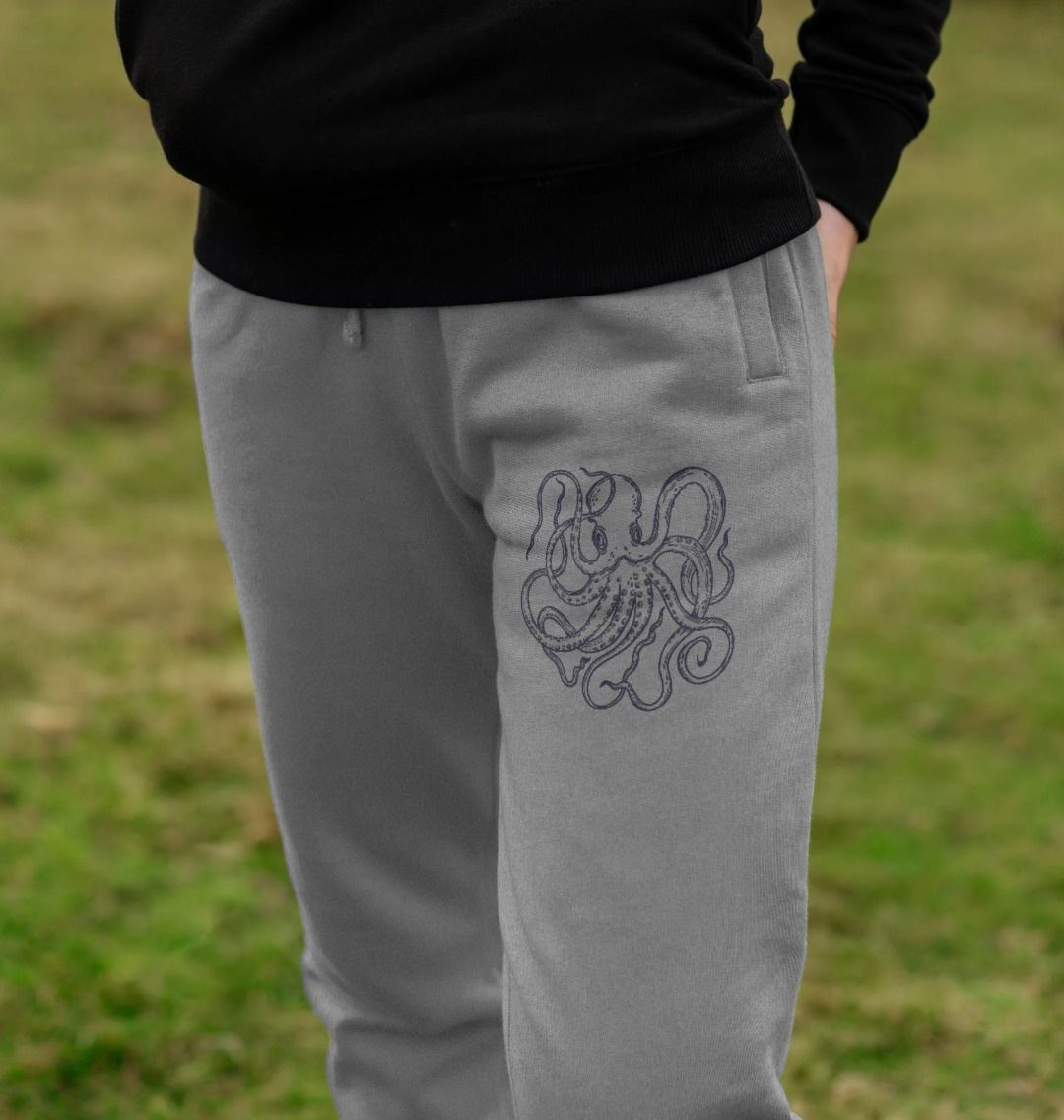 Gray sweatpants with octopus design (person)