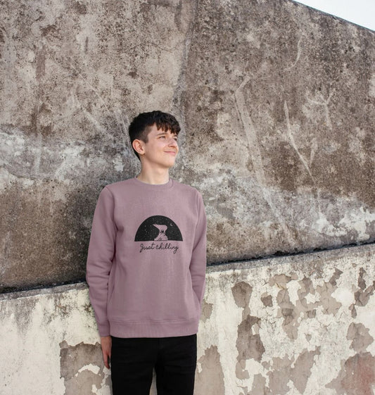 Purple sweatshirt with "Just Chilling" graphic (person)