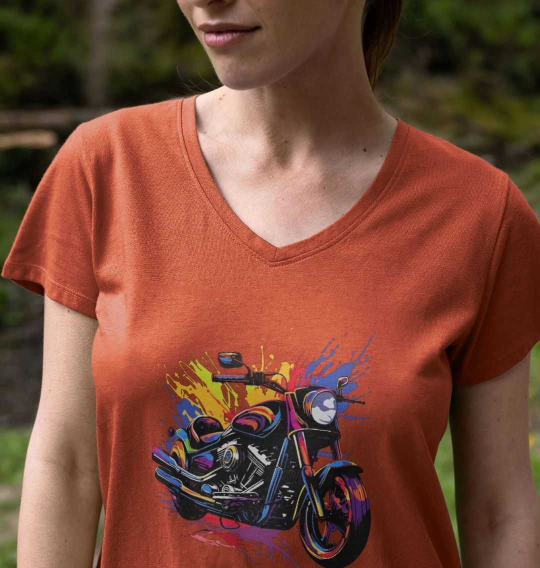 Orange t-shirt with colorful motorcycle graphic (person)