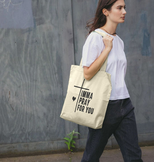 Natural canvas tote bag with "IMMA PRAY FOR YOU" text (person)