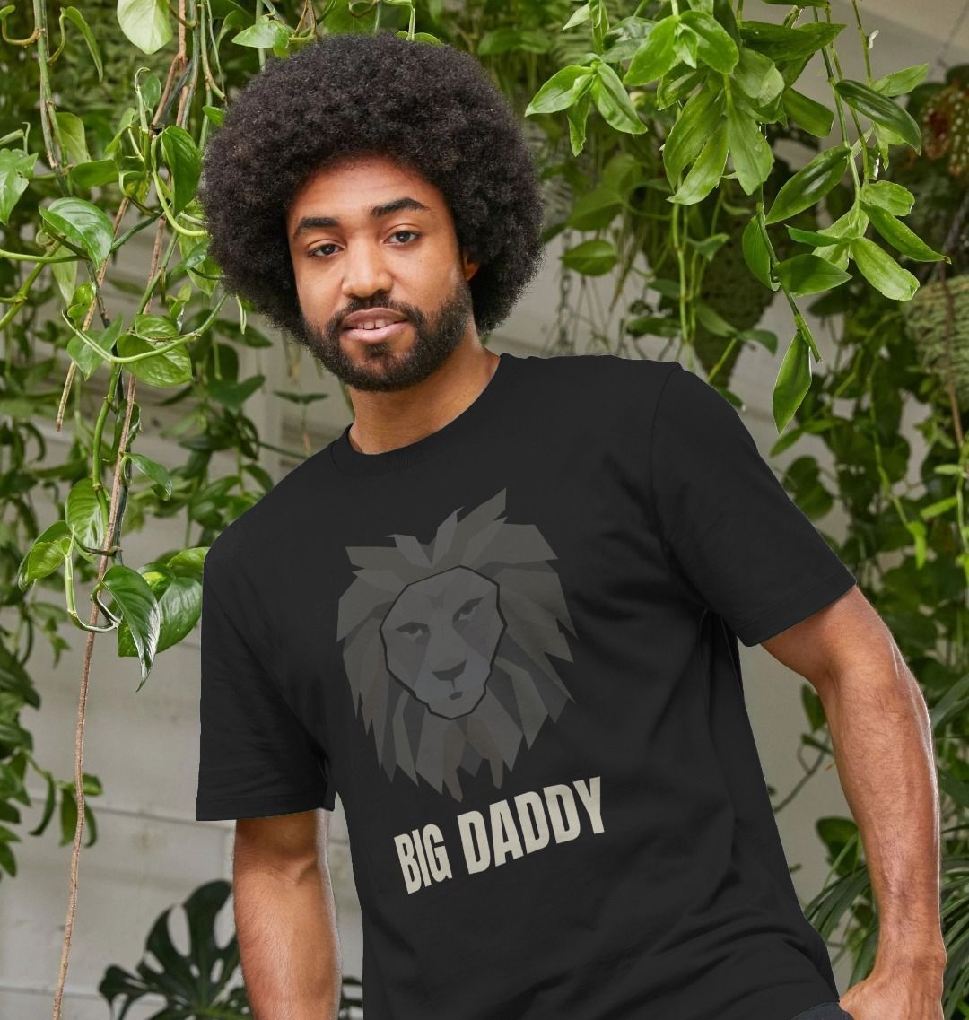 Black t-shirt with lion graphic and text "BIG DADDY" (person)