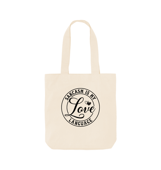 White tote bag with "SARCASM IS MY LOVE LANGUAGE" text