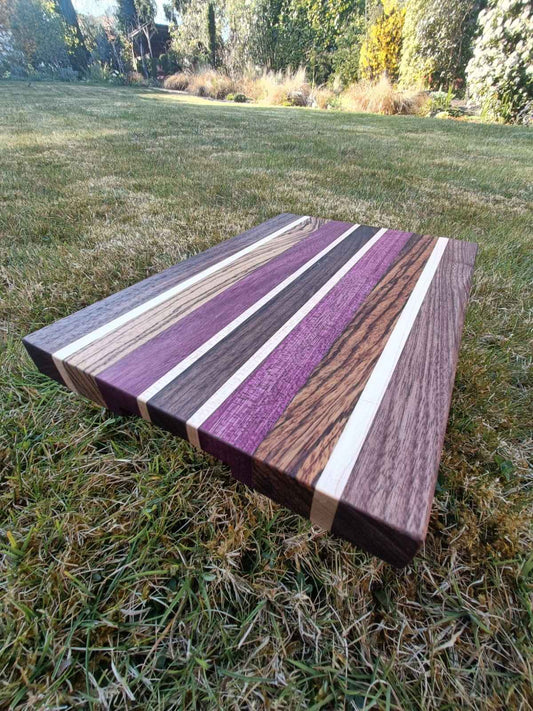 Wooden cutting board with striped design