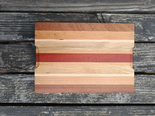 Wooden cutting board with striped design