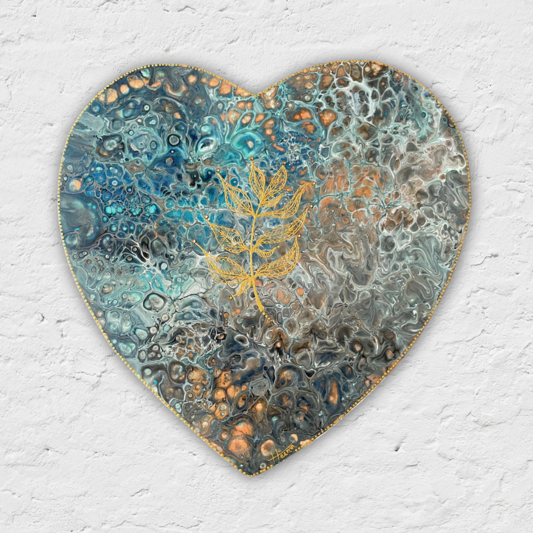 Heart-shaped wall art with abstract design