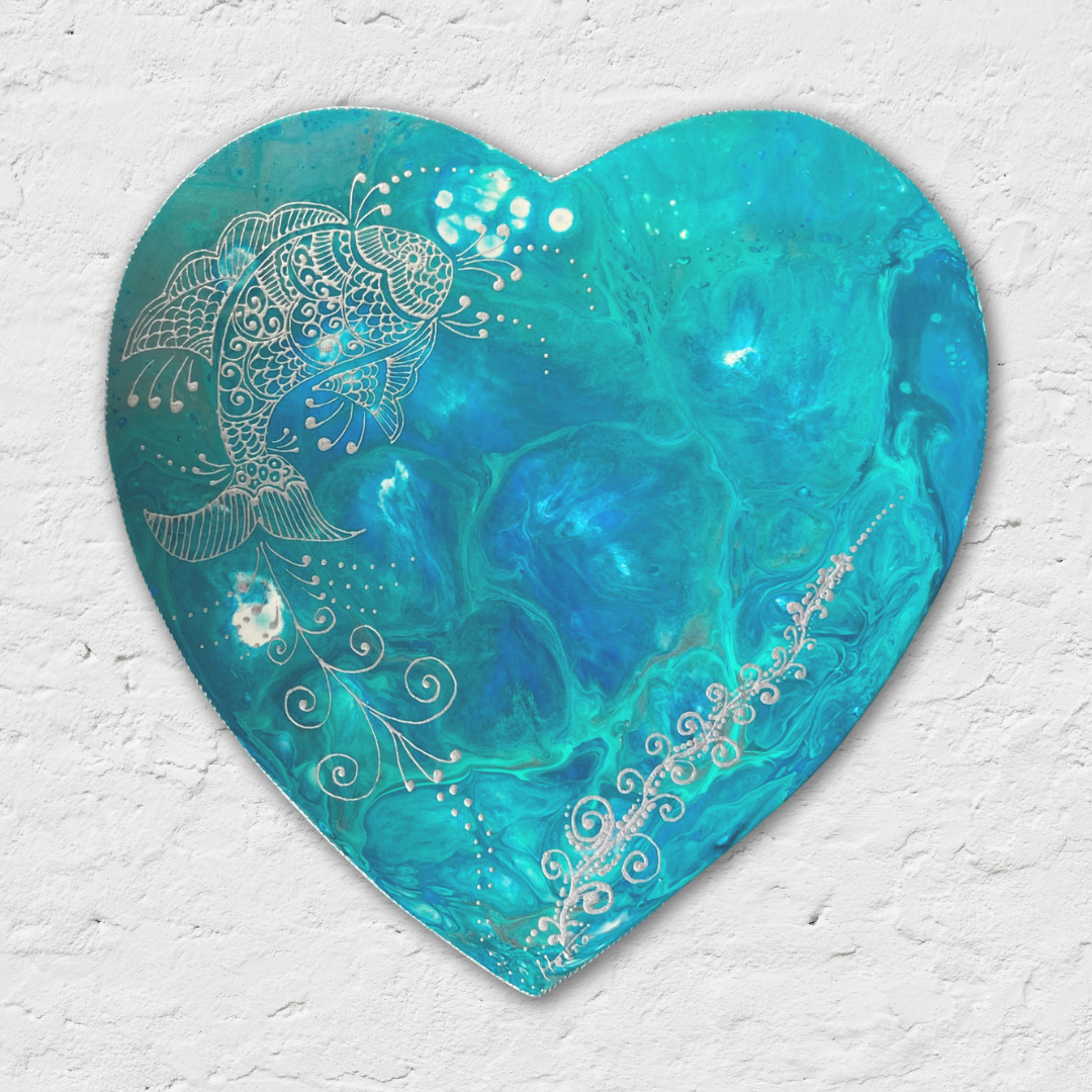 Heart-shaped wall art with blue and teal abstract design