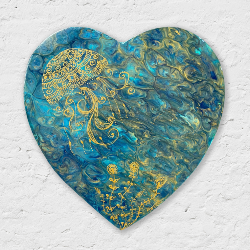 Heart-shaped wall art with blue and gold swirls