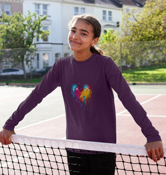 Purple long-sleeve t-shirt with colorful heart design (person)
