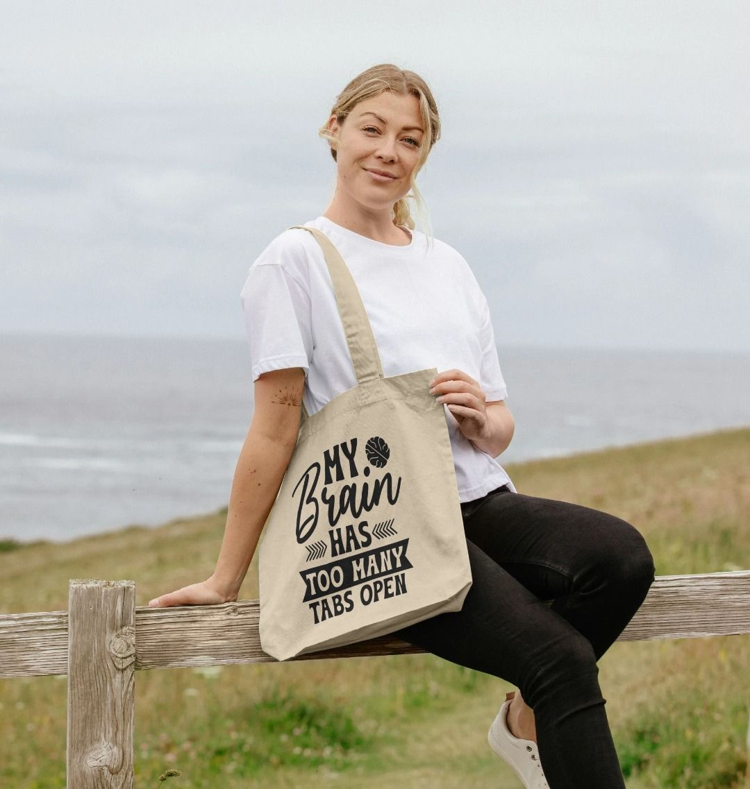 Canvas tote bag with "My Brain Has Too Many Tabs Open" text (person)