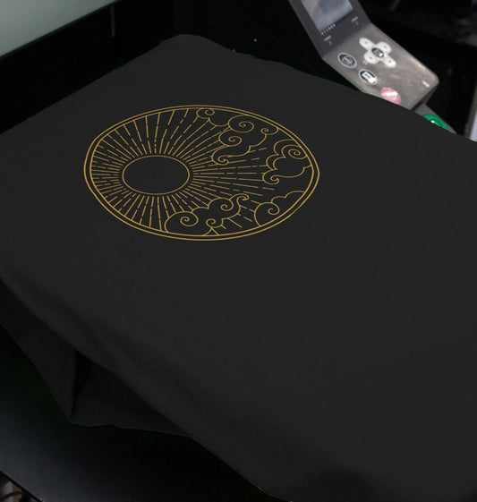 Black t-shirt with gold circular design
