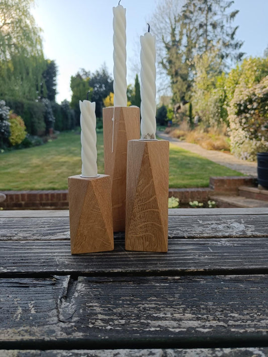 Wooden candle holders with white candles