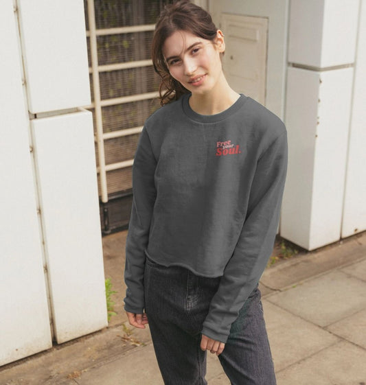 Gray sweatshirt with "Free Your Soul" text (person)