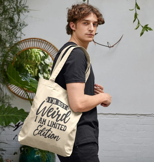 Natural canvas tote bag with "I'm Not Weird, I Am Limited Edition" text (person)