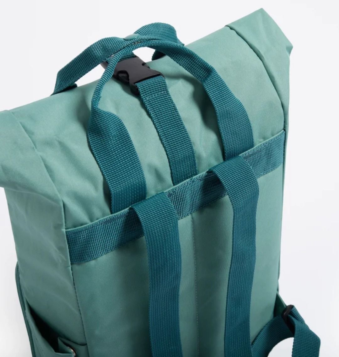 Teal backpack with roll-top closure
