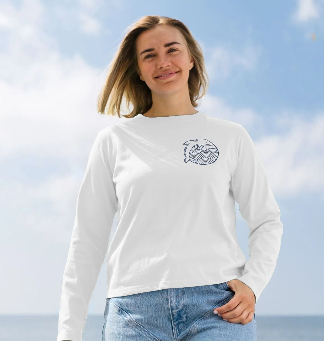 White long-sleeved t-shirt with dolphin graphic (person)