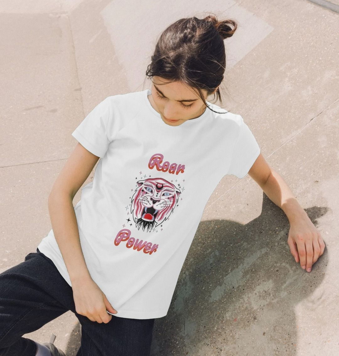 White t-shirt with tiger graphic and "Roar Power" text (person)