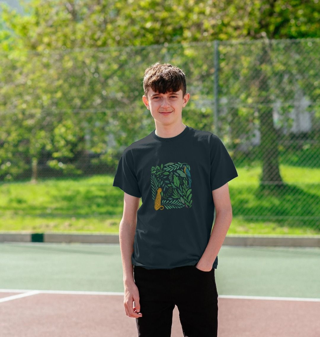 Black t-shirt with green leaf and cat design (person)