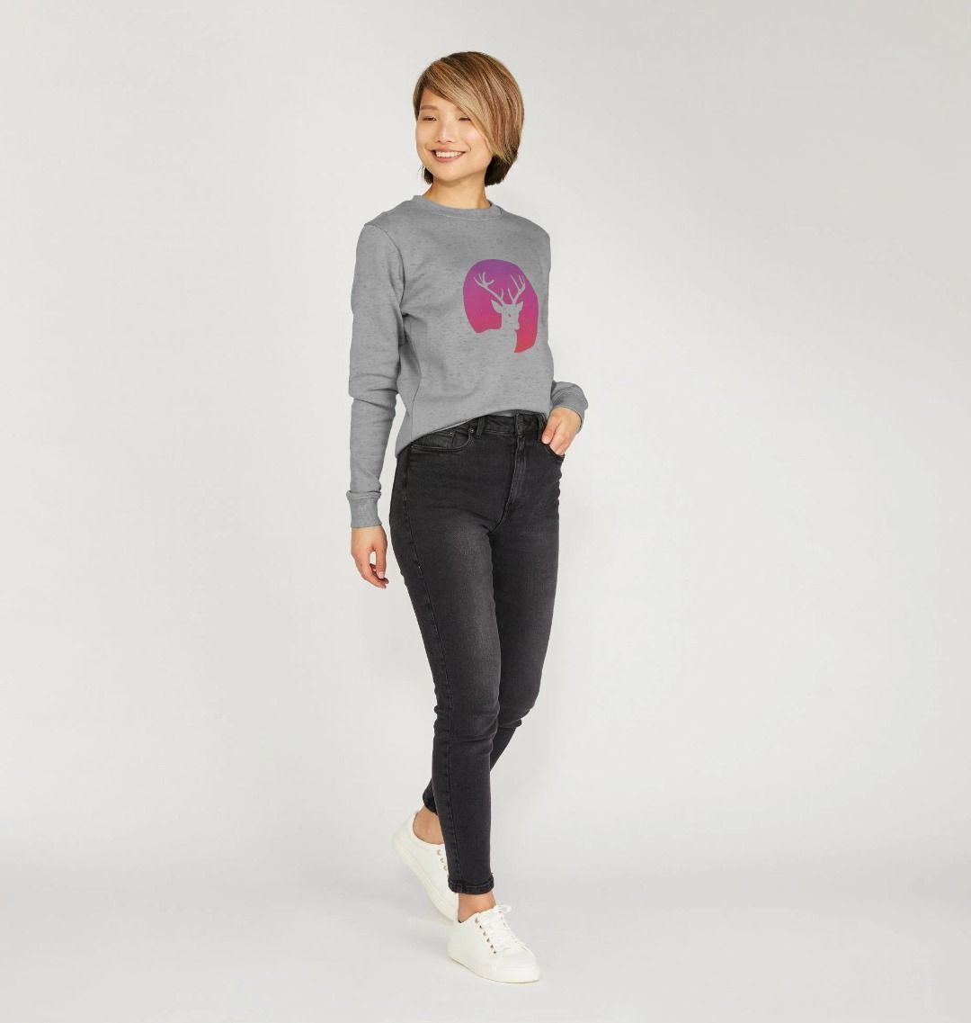 Gray sweatshirt with deer graphic (person)