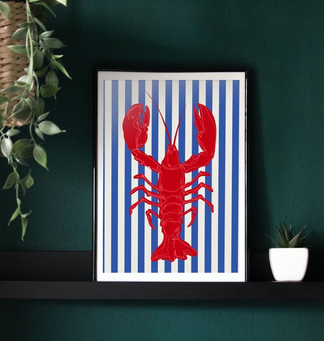 Framed lobster illustration on striped background