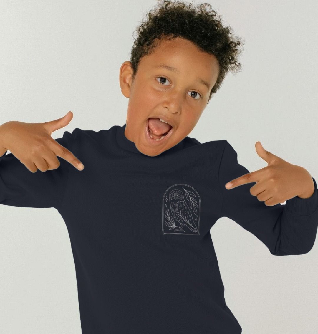 Navy blue long-sleeve t-shirt with owl graphic (person)