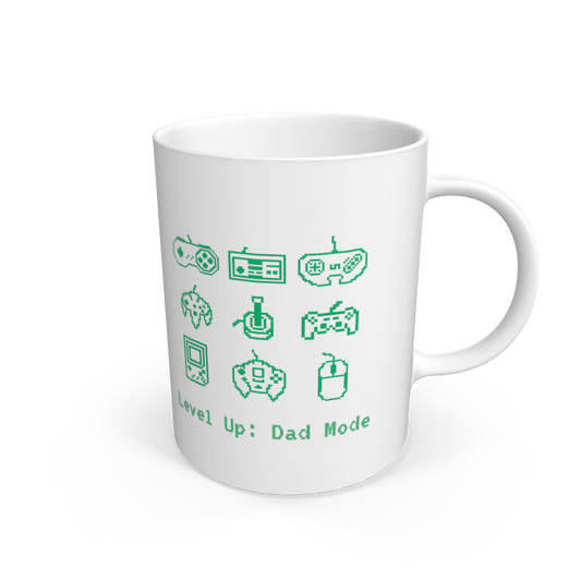 White ceramic mug with pixelated gaming icons and text