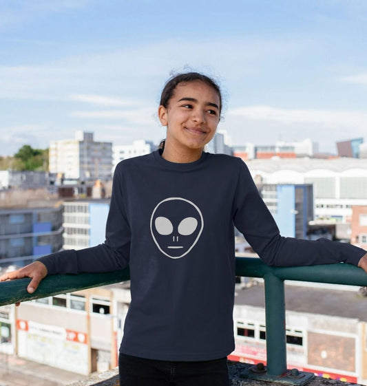 Navy blue long-sleeved t-shirt with alien face graphic (person)