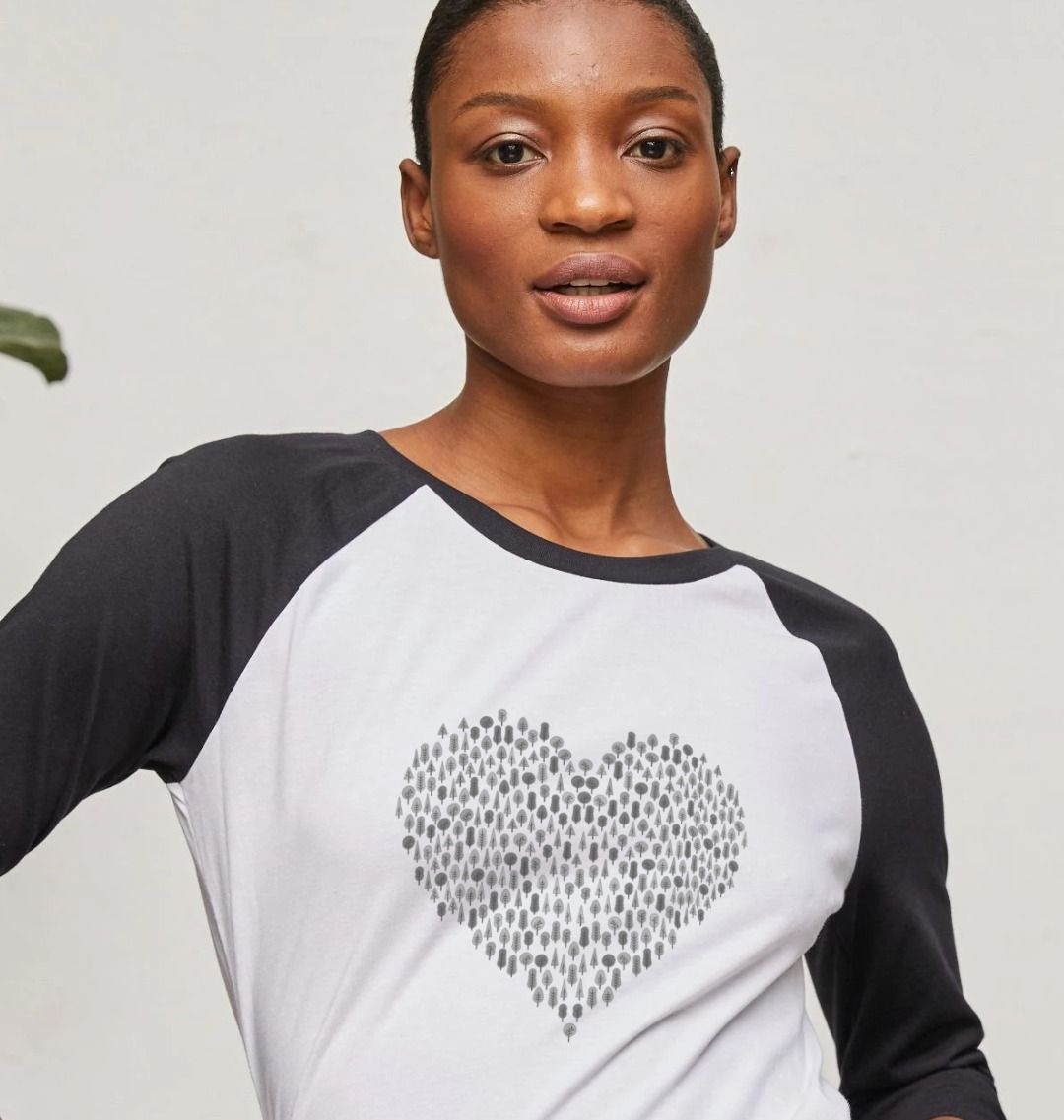 White and black raglan t-shirt with heart design (person)