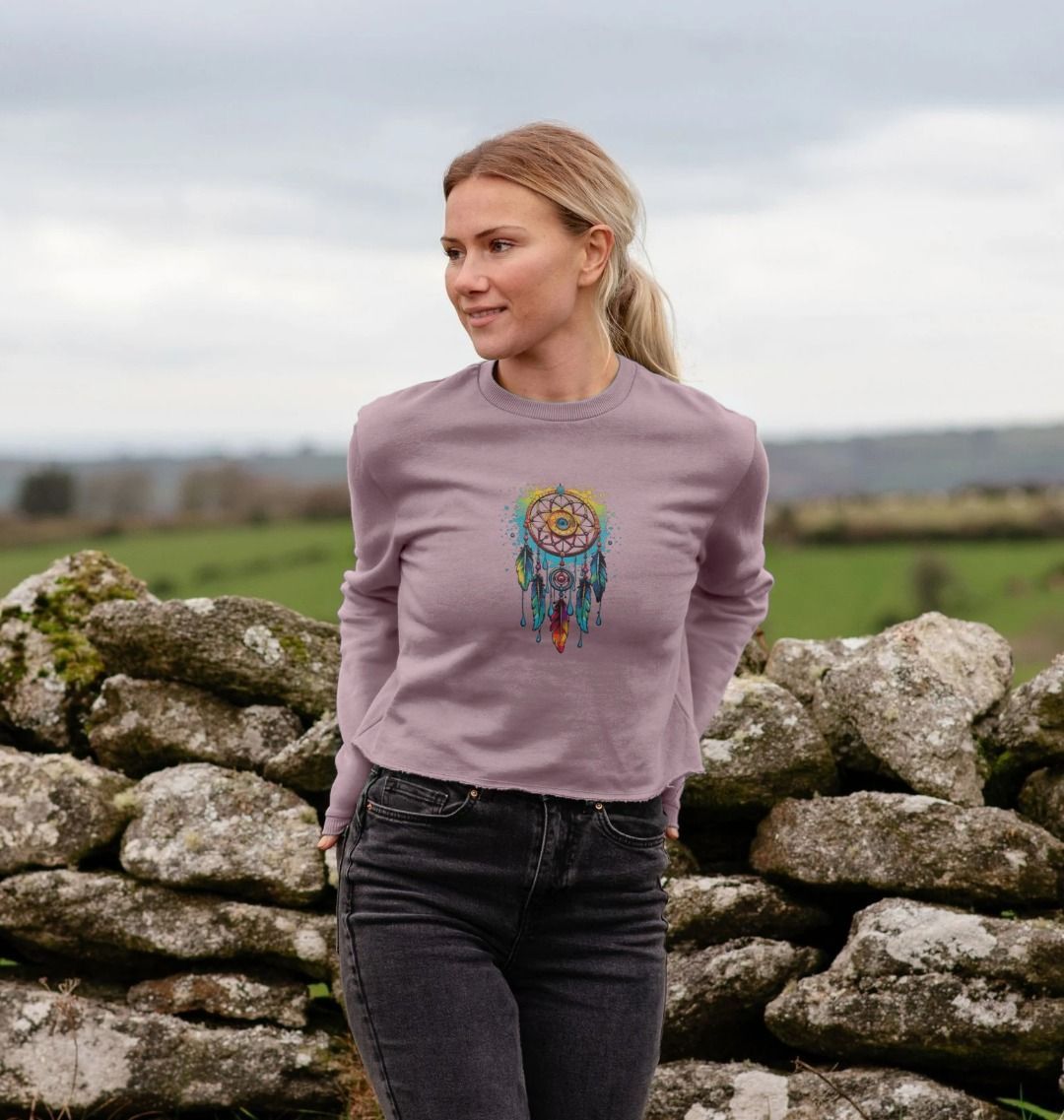 Lavender sweatshirt with dreamcatcher design (person)