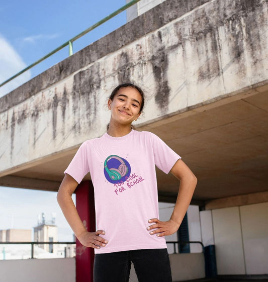 Pink t-shirt with "Too Cool For School" text and headphones graphic (person)