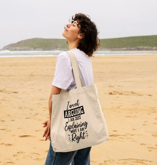 White tote bag with text design (person)