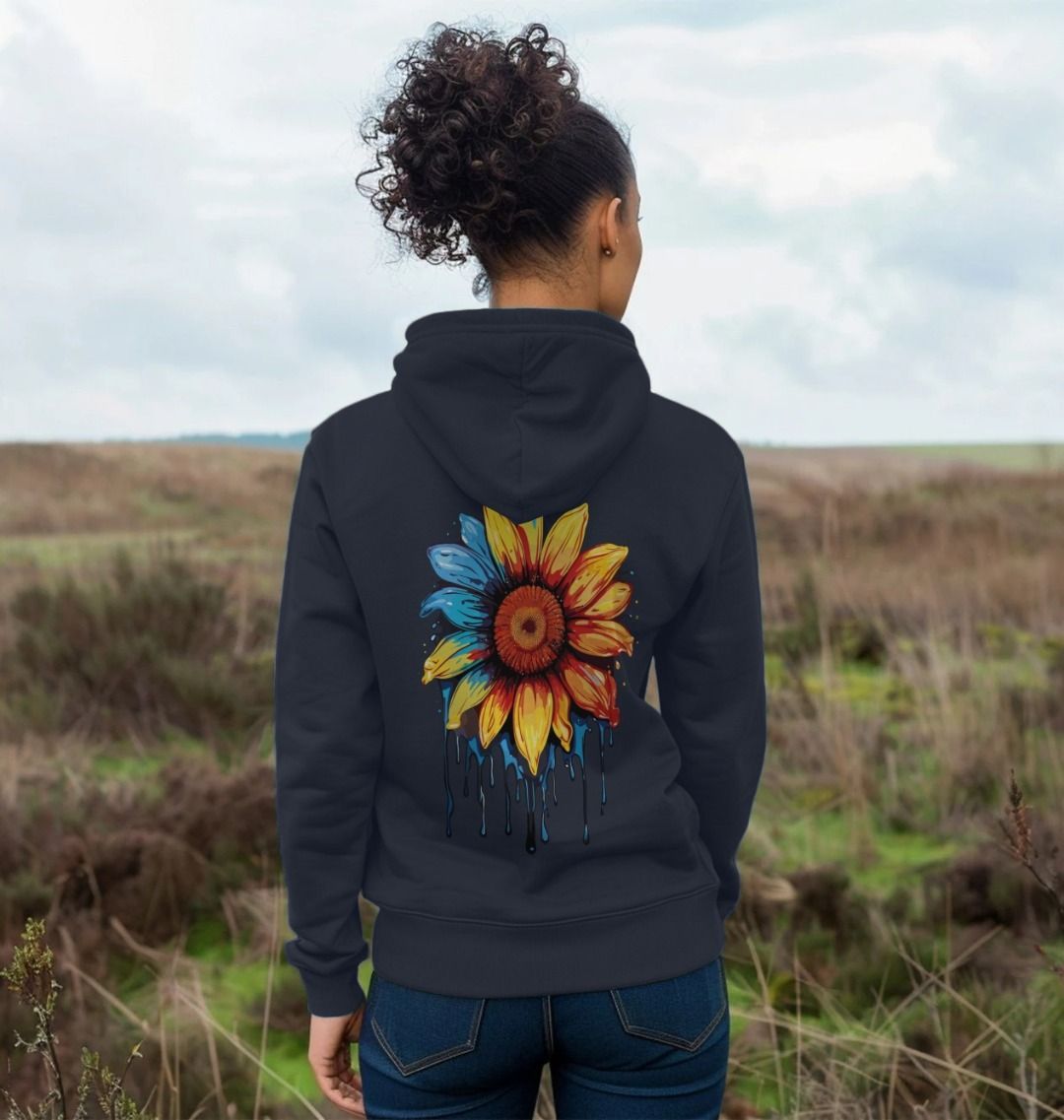 Black hoodie with colorful sunflower design (person)