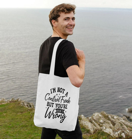 White tote bag with text design (person)
