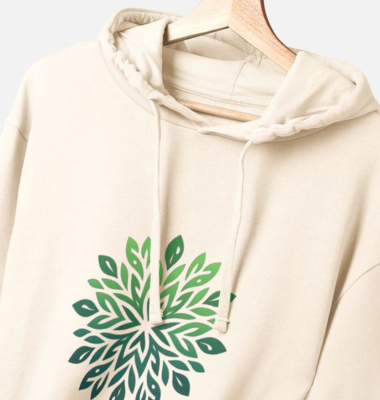 Cream-colored hoodie with green leaf design