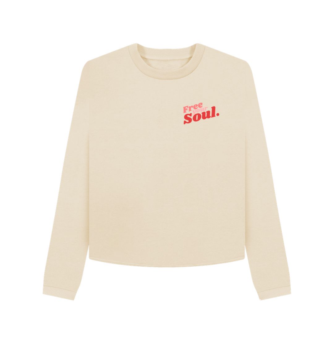 Cream-colored long-sleeve sweatshirt with "Free Your Soul" text