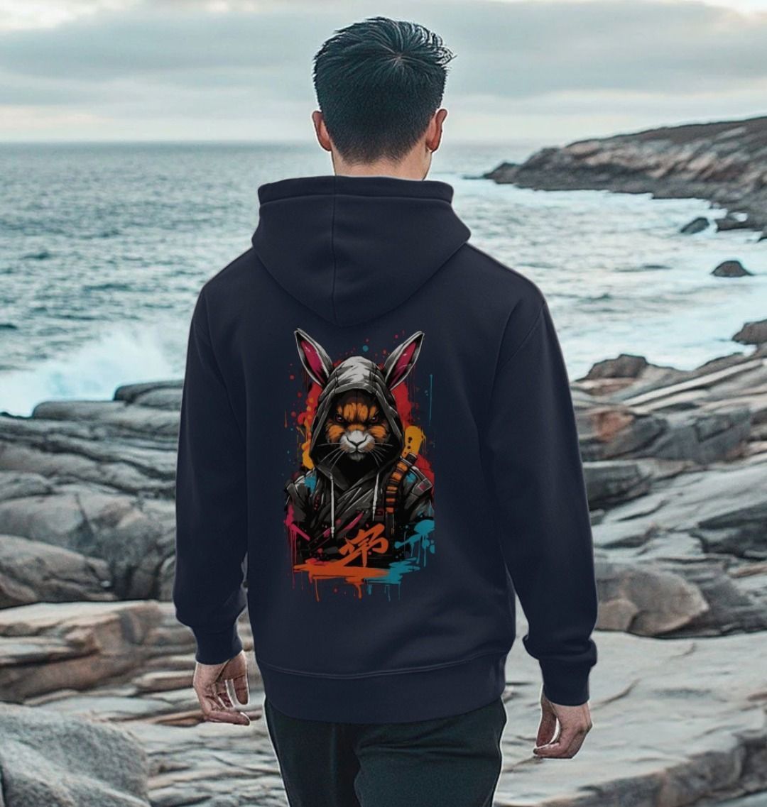Black hoodie with colorful rabbit graphic (person)