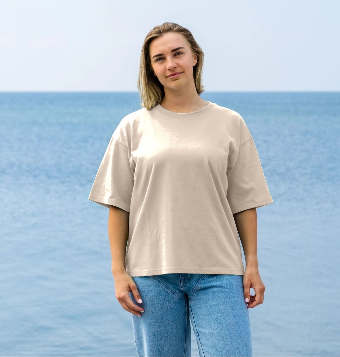 Oversized beige t-shirt with relaxed fit (person)